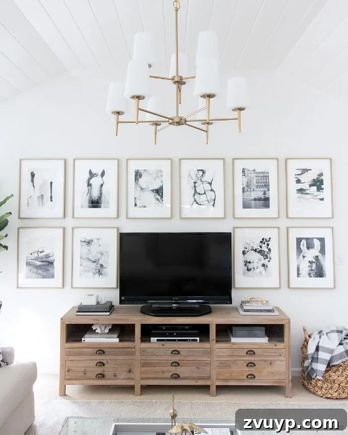 Beyond the Screen: Creative Ways to Style Your TV Area 9 Grid style gallery wall making a TV look like part of the framed art.
