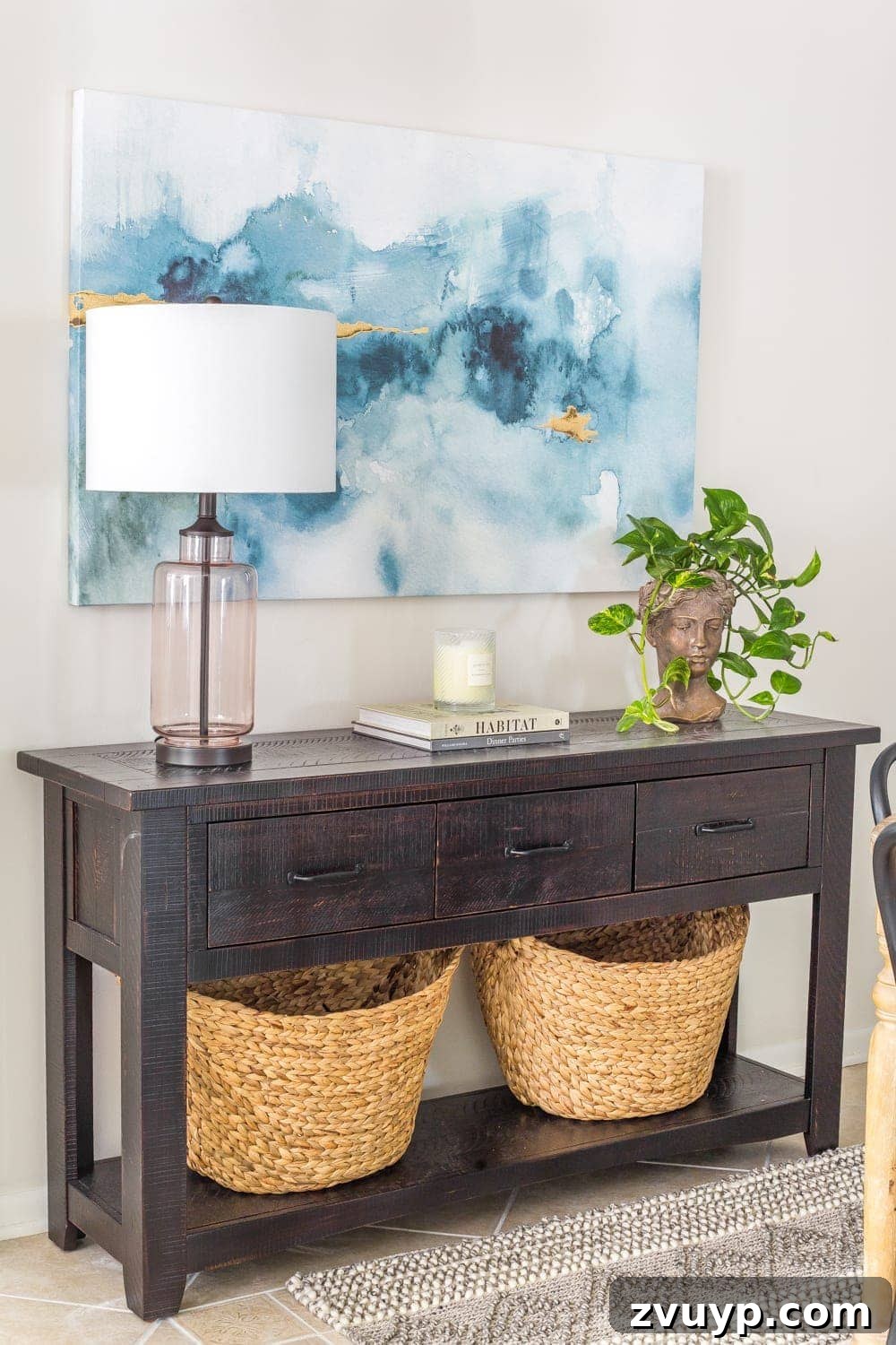Breakfast Nook Glow Up 8 Blue abstract art adds a modern coastal touch to a small breakfast nook.