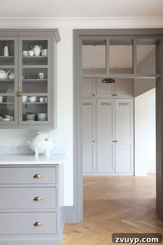Stylish Shades to Pair with Gray Trim 6 A round-up of taupe and gray trim paint inspirations for a modern-meets-classic look and the best paint colors to pull it off. #graytrim #taupetrim
