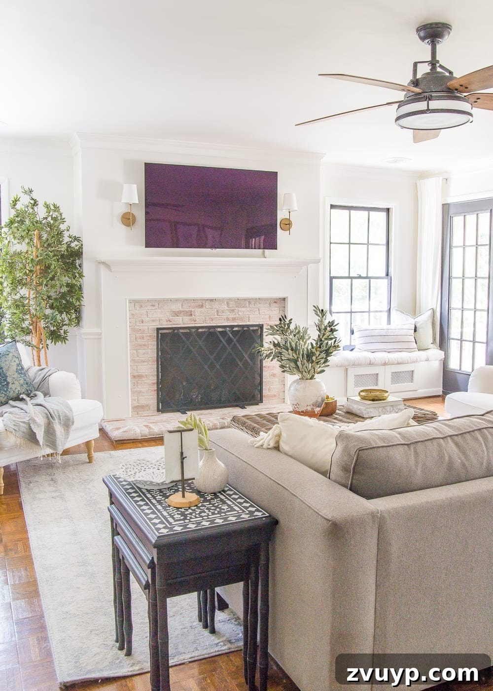 Shop Neutral Fall Faux Greenery Deals at Wayfair and Birch Lane 3 Stylish neutral fall living room featuring faux olive branches, demonstrating versatile decor that works for all seasons, not just autumn, in a modern home.