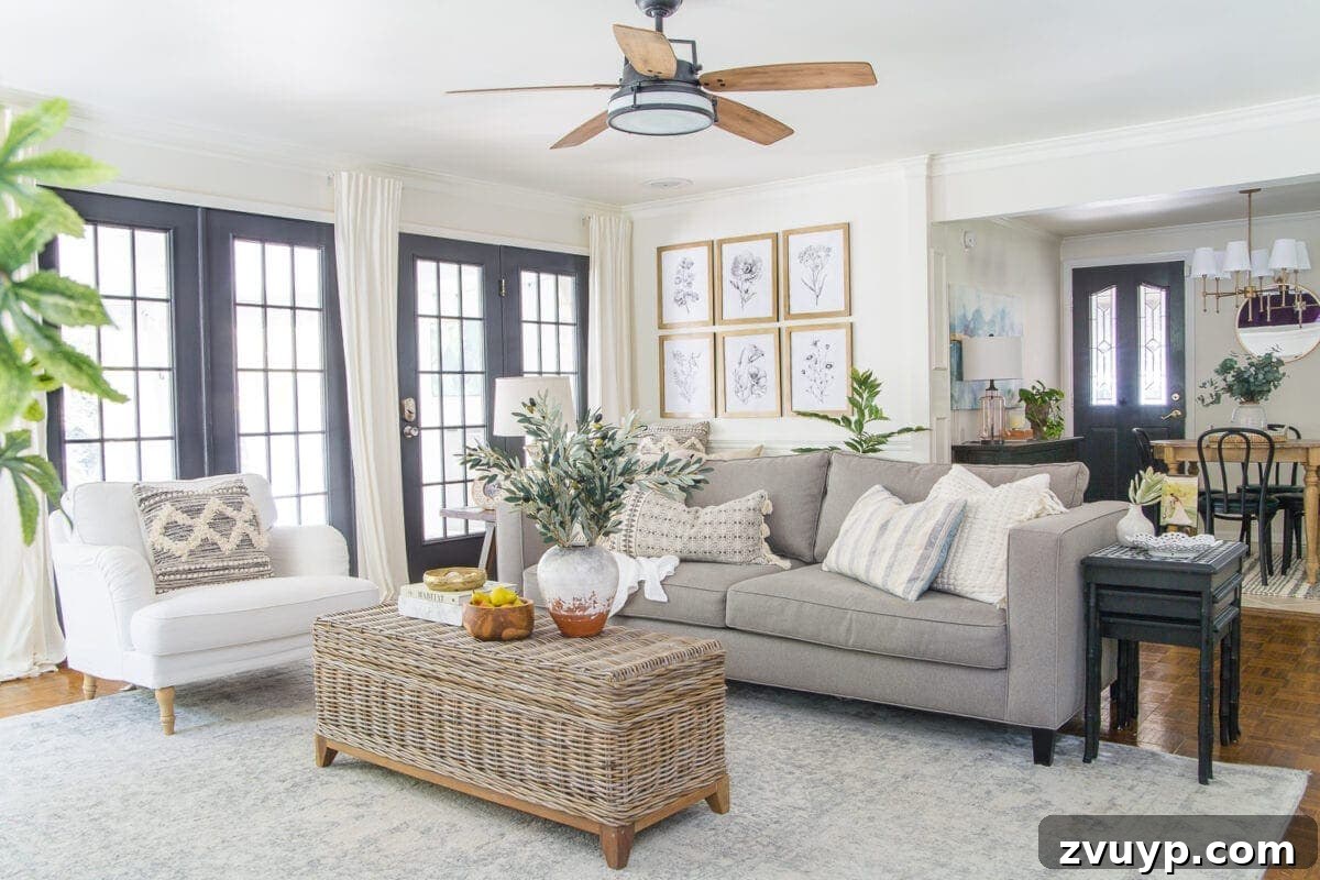 Shop Neutral Fall Faux Greenery Deals at Wayfair and Birch Lane 6 A large faux olive tree, a perfect example of neutral fall greenery that offers year-round decorative appeal and low maintenance, enhancing any interior space.