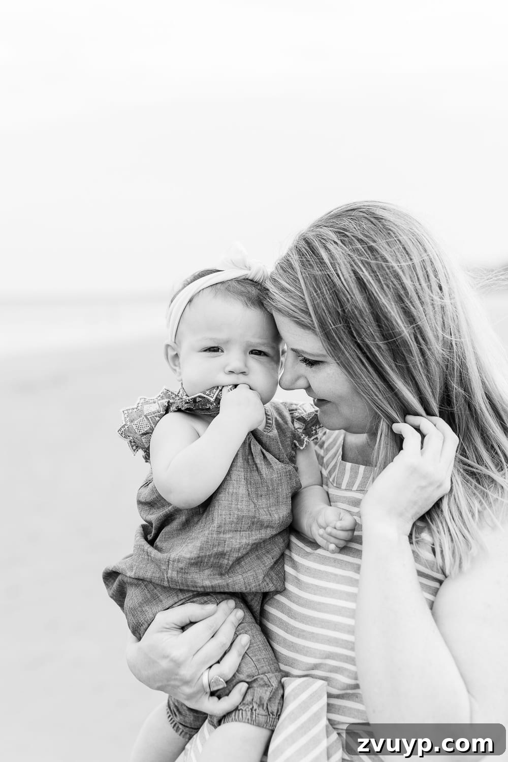 The Fog of Motherhood My PPD Story 4 Mother looking thoughtfully, depicting the internal struggle and emotional numbness associated with postpartum depression.