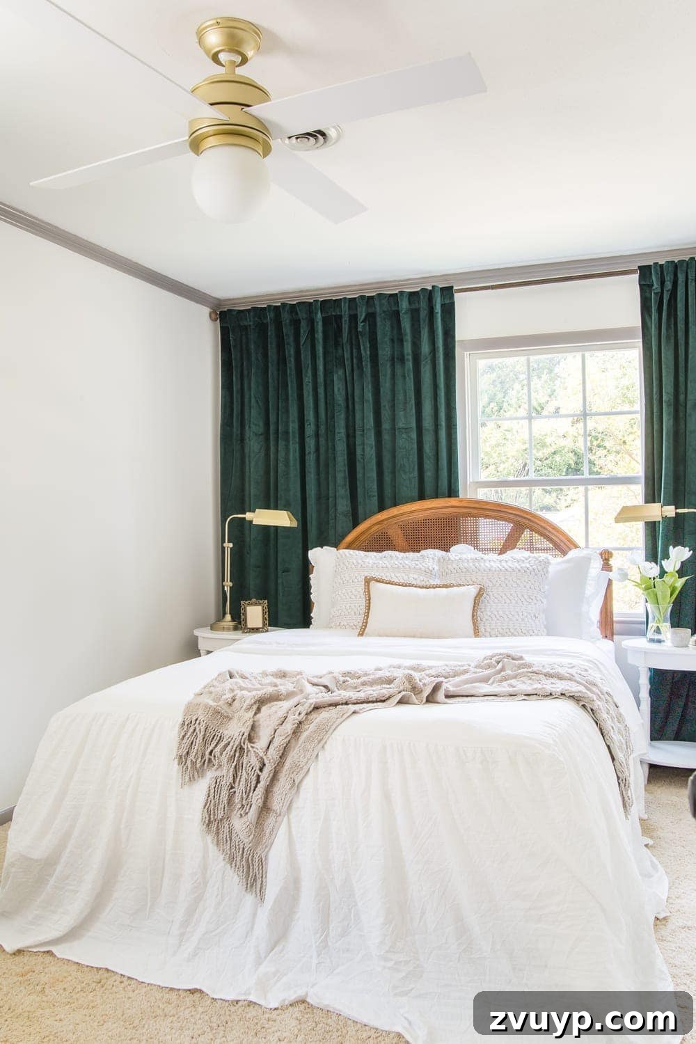 Revitalizing Old Cane Furniture 6 Guest bedroom makeover with linen skirted vintage style bedding and thrifted cane headboard, showing the Hunter Fan Co. ceiling fan and overall room ambiance.