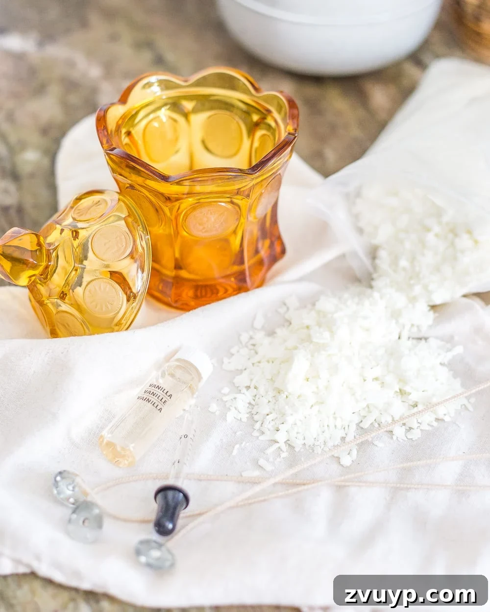 Sweet Dish Glow: DIY Candle Making 4 Finished soy wax candles in repurposed amber glass candy dishes, showcasing a simple DIY project for beginners.