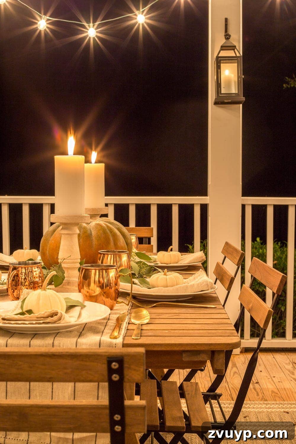 Cozy Fall Porch: Crafting Your Capsule Decor Style 17 Fall Back Porch at Night | How to style your outdoor spaces for autumn using capsule decor items that will last throughout the seasons and get the most bang for your buck.