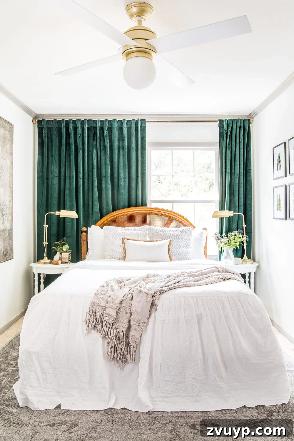 A boring guest bedroom gets a luxe, vintage chic makeover using thrifty projects, budget finds, and simple decorating tricks to maximize style and space. After image showing a beautifully decorated vintage chic guest bedroom.