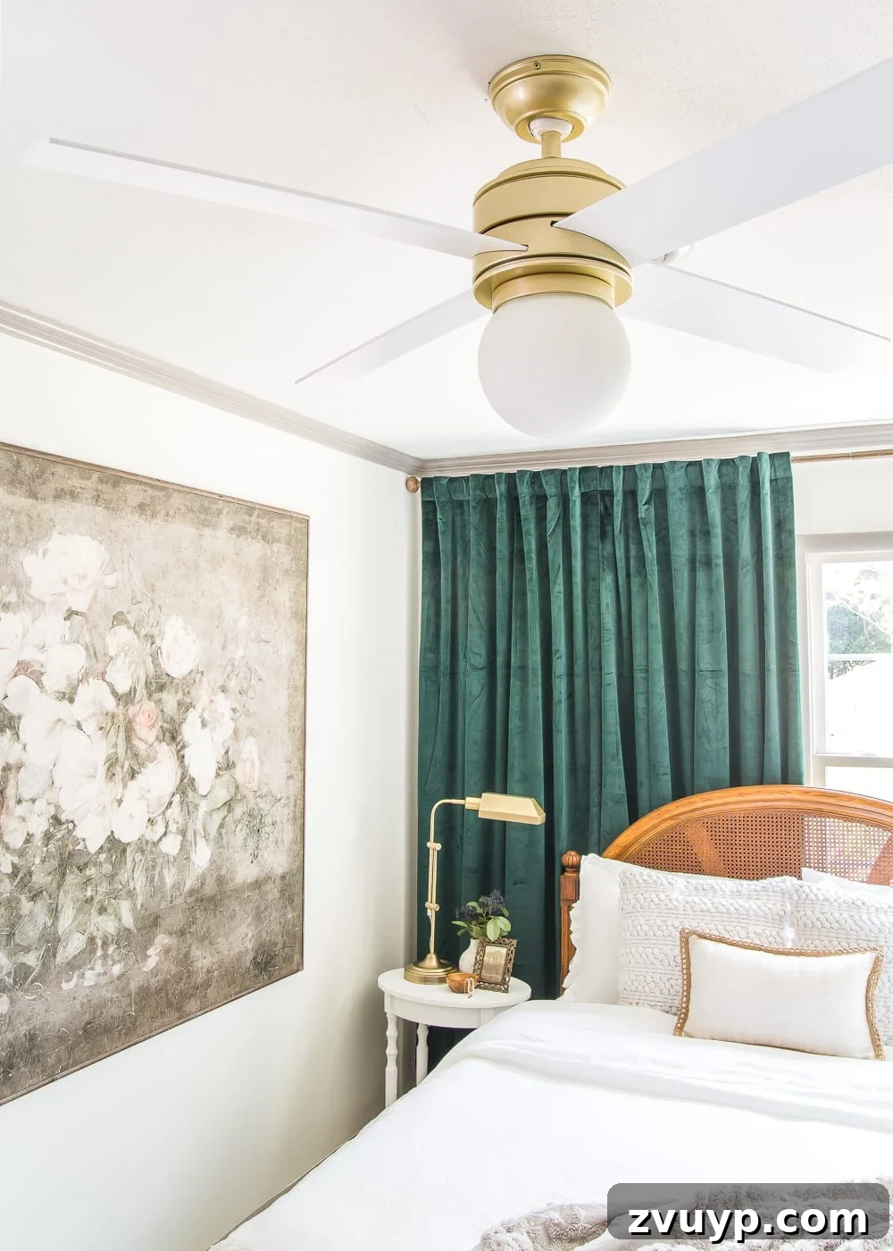 20 Handpicked Modern Ceiling Fans to Adorn Your Home 6 Gorgeous matte brass modern ceiling fan in a guest bedroom, blending functionality with high-end design.