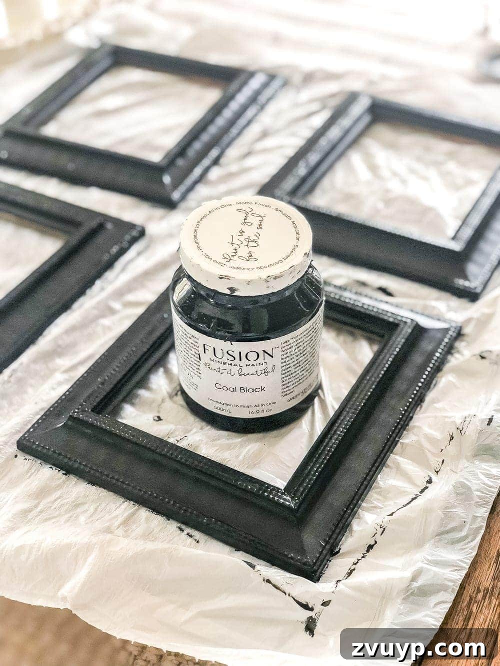 Frame Revival Antique Mirror Transformation 5 Painting picture frames black with Fusion Mineral Paint.