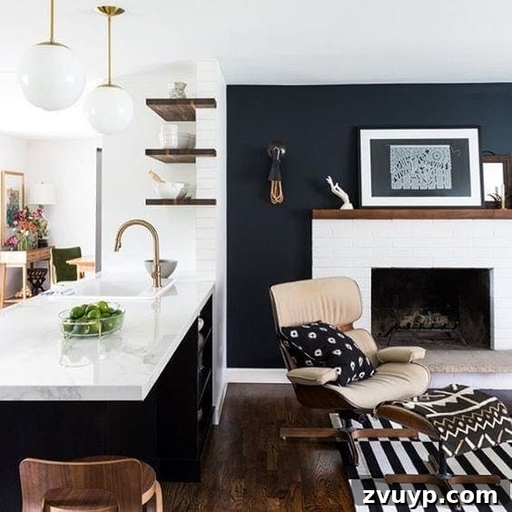 Black Paint: A Bold Design Statement 16 Elegant black bathroom with a freestanding tub and ample natural light