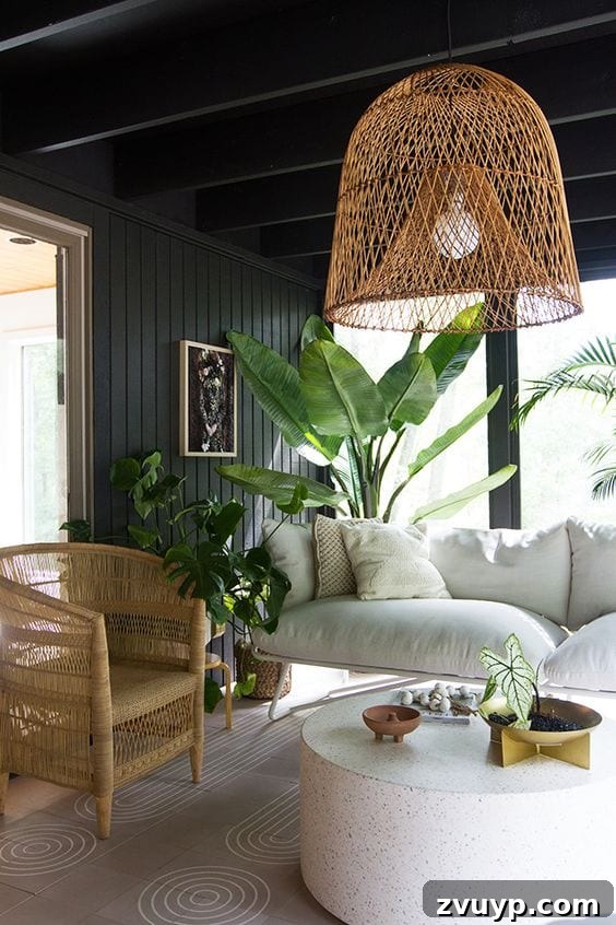 Black Paint: A Bold Design Statement 24 Chic black front porch or entryway with stylish seating