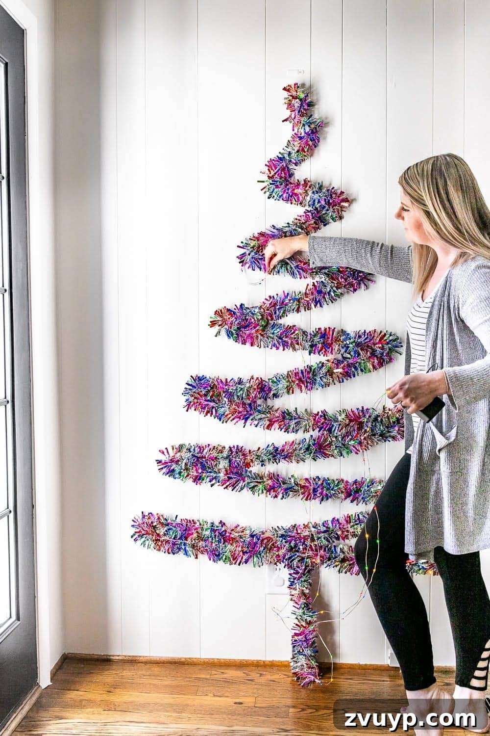 Thrifty Wall Christmas Tree with Twinkling Lights 7 adding lights to a wall Christmas tree