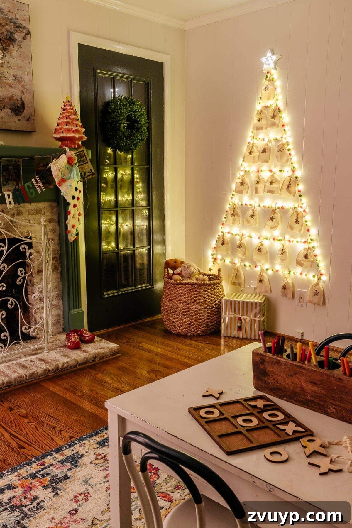 Thrifty Wall Christmas Tree with Twinkling Lights 10 kids' DIY Advent calendar on a wall in a playroom