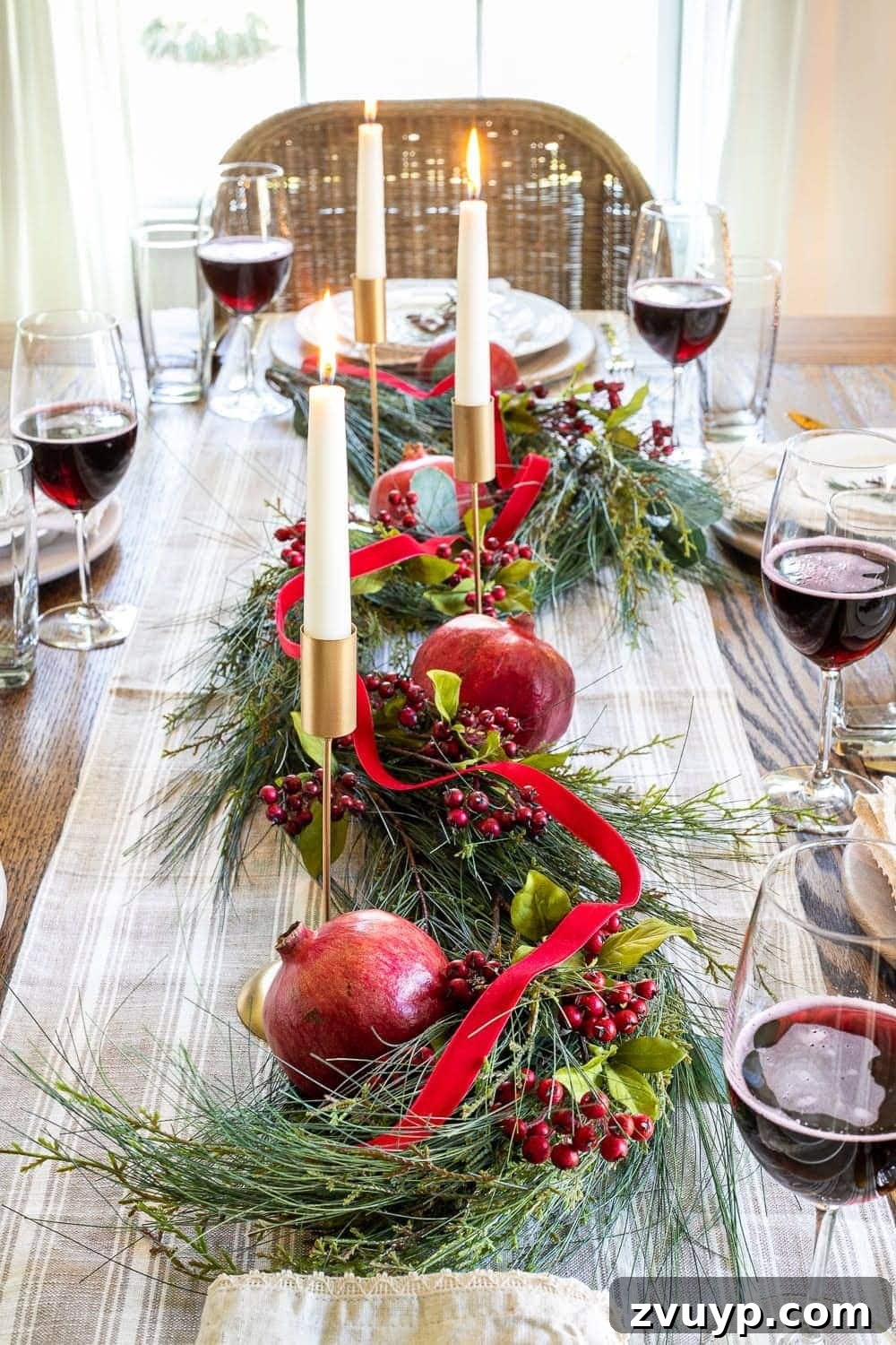 Festive Home Tour 11 Christmas decor ideas: A simple and elegant Christmas centerpiece, featuring natural elements and classic design, perfect for a cozy holiday dining experience.