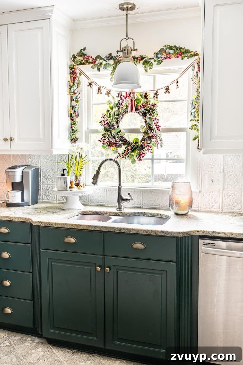 Festive Home Tour 13 Christmas decor ideas: Decorate a kitchen window with a charming wreath and elegant garland for a festive holiday look. Simple yet impactful Christmas decorating.