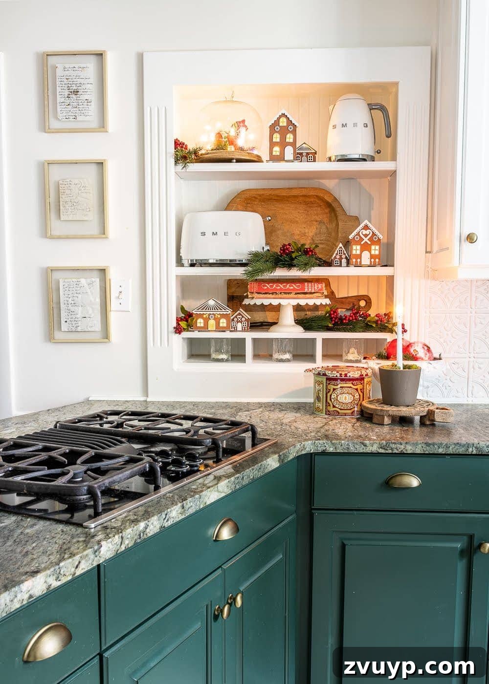 Festive Home Tour 15 Christmas decor ideas: Kitchen shelves beautifully adorned with festive decorations like gingerbread houses, alongside framed handwritten recipes from past generations, blending tradition and charm.