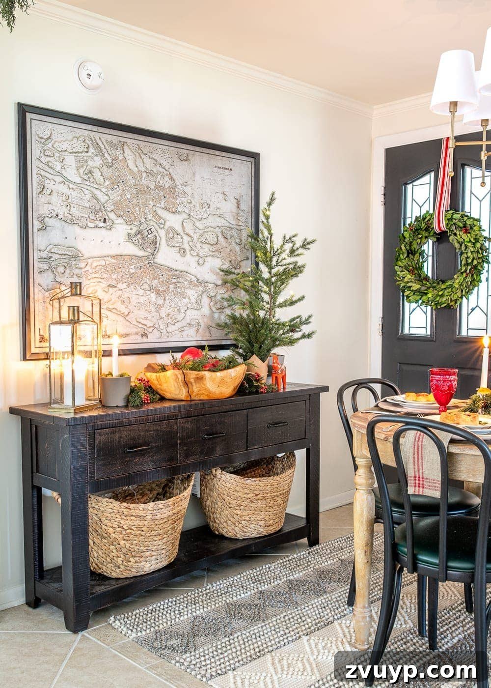 Festive Home Tour 18 Christmas decor ideas: A cozy Christmas breakfast nook featuring a beautifully decorated console table, creating a warm and inviting holiday space for family gatherings.