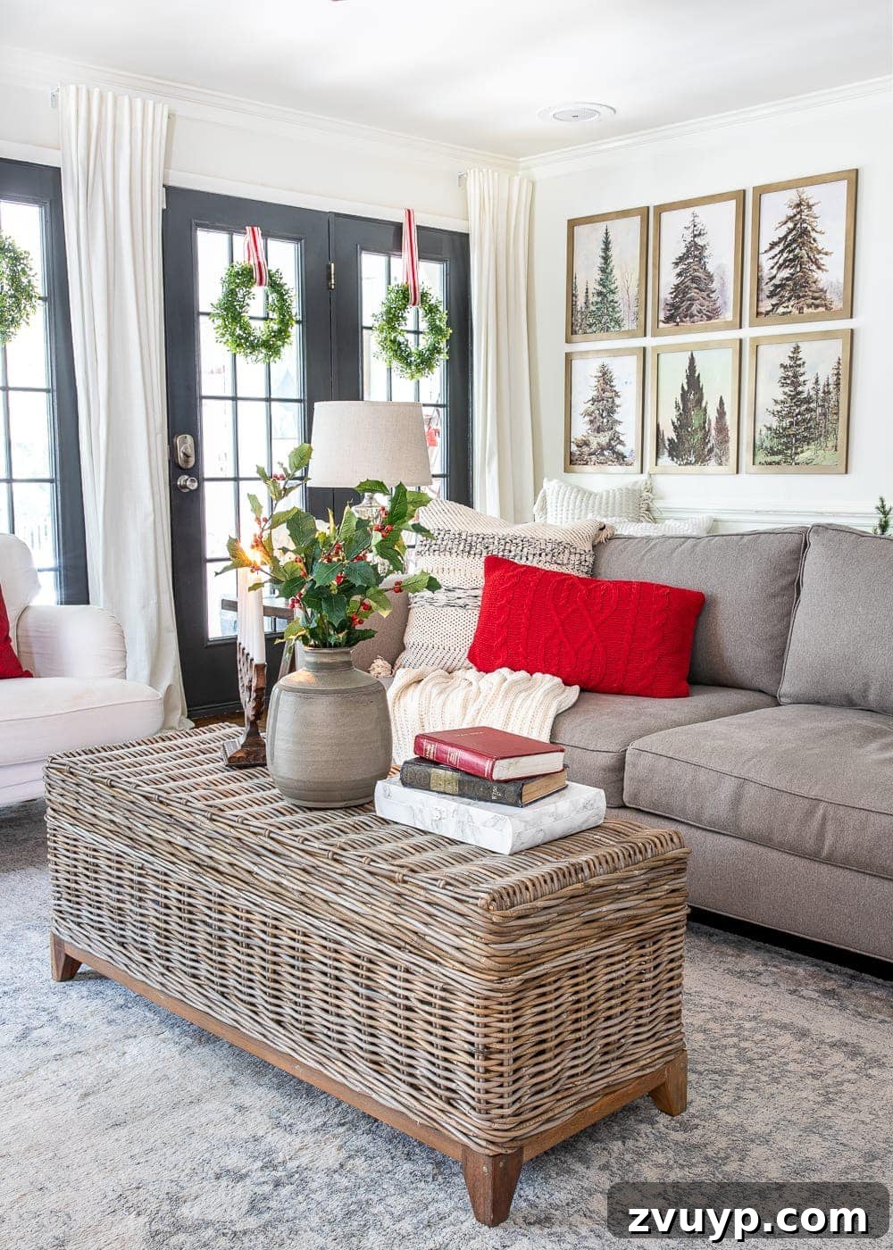 Festive Home Tour 24 Christmas decor ideas: A modern cozy Christmas living room designed for comfort and festive gatherings, showcasing contemporary holiday decor blended with traditional elements.