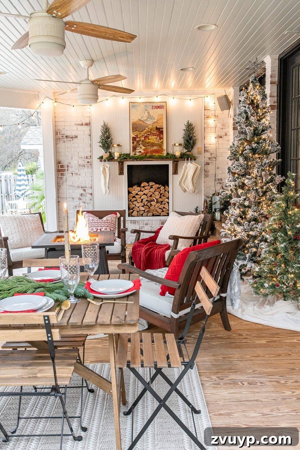 Warm Yuletide Veranda 4 Charming outdoor Christmas setup featuring a faux fireplace and a functional fire pit