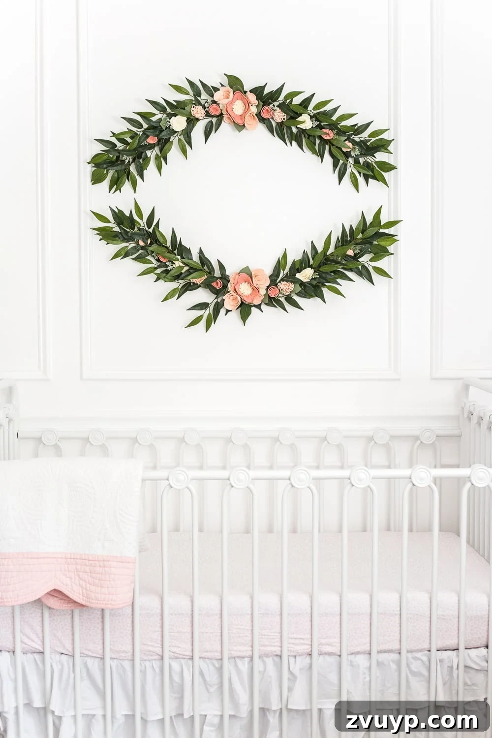 The Items That Defined My 2019 7 Beautiful felt flower wall swag decorating a nursery wall.
