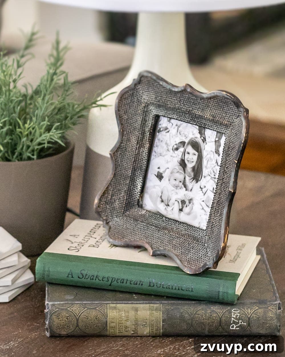 Effortless End Table Decorating Ideas 5 how to style end tables - using picture frames and books as risers