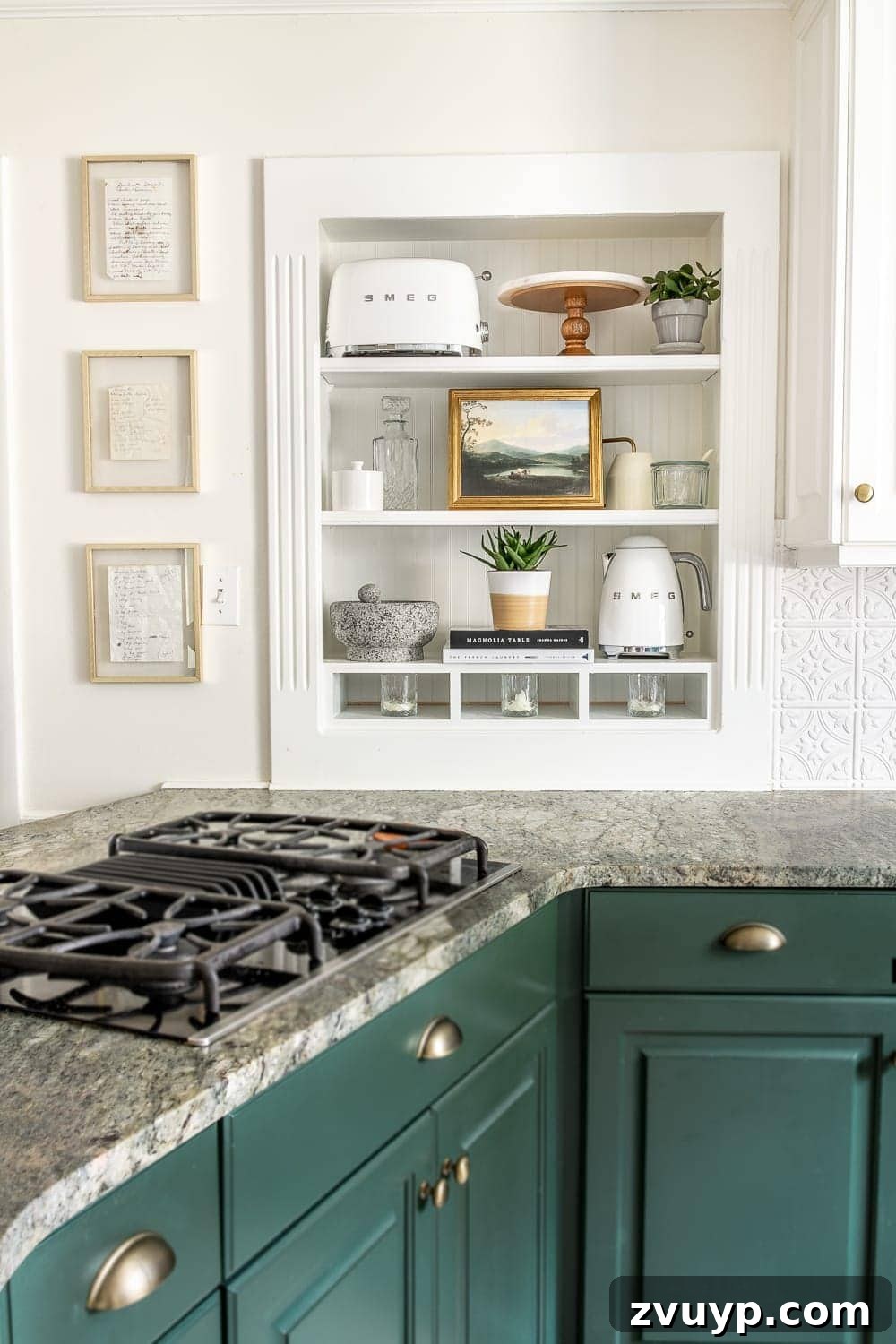 Simple Ways to Style Your Shelves 2 A beautifully decorated kitchen shelf with various decor items like a kettle, toaster, framed art, and plants, demonstrating effective shelf styling.