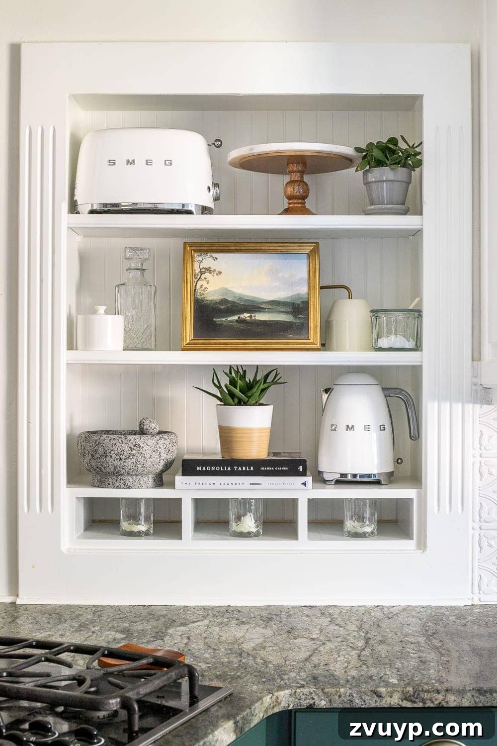 Simple Ways to Style Your Shelves 11 Plants add a vibrant pop of green and life to the styled kitchen shelves.