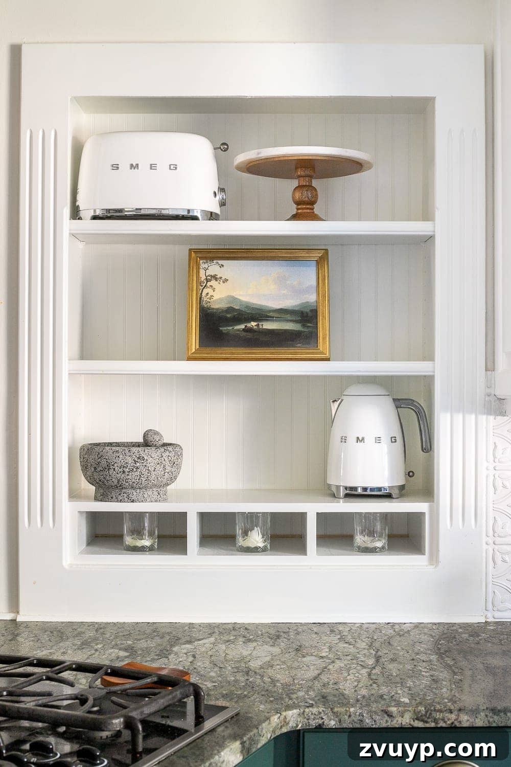 Simple Ways to Style Your Shelves 7 Larger decor items are strategically placed on shelves to create balance and visual anchors.