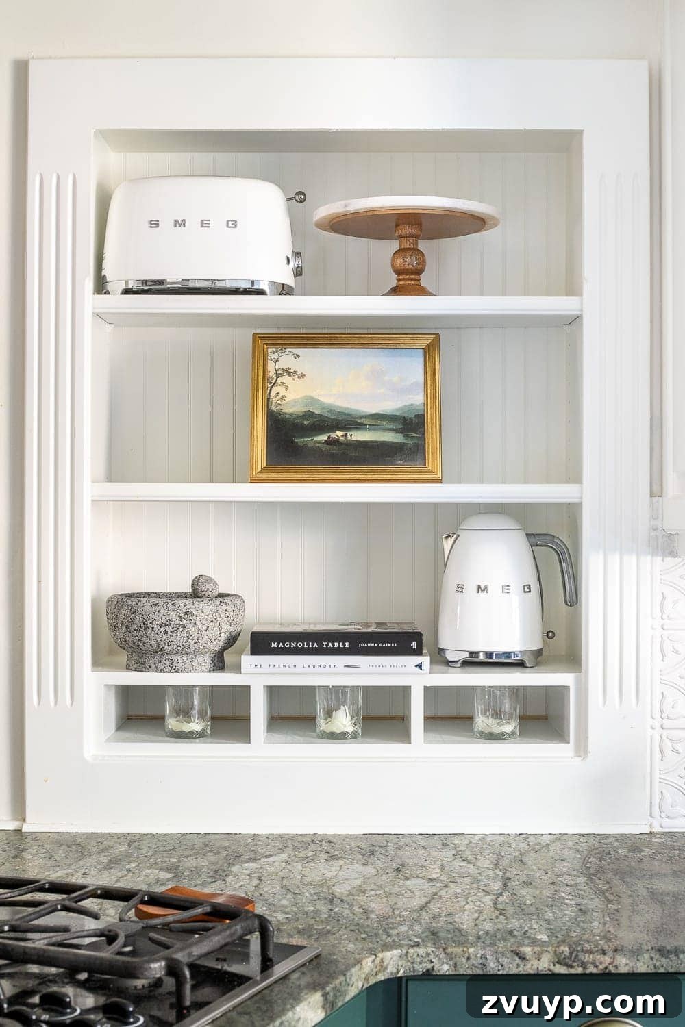 Simple Ways to Style Your Shelves 8 Books are stacked and arranged on shelves, providing height and a foundation for smaller decorative items.