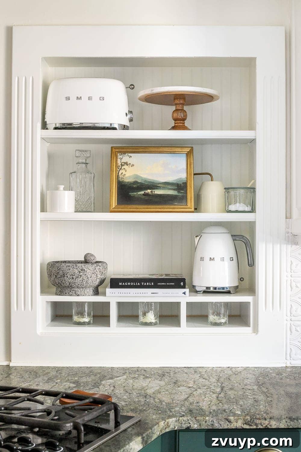 Simple Ways to Style Your Shelves 9 Smaller accents like glass pieces and decorative objects are used to fill in spaces between larger decor.