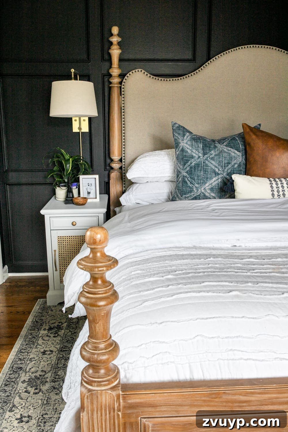 Clever Hacks for a Cloud-Like Bed on a Budget 6 A perfectly styled bed with throw pillows that have been lightly 'karate chopped' for a soft, inviting look.