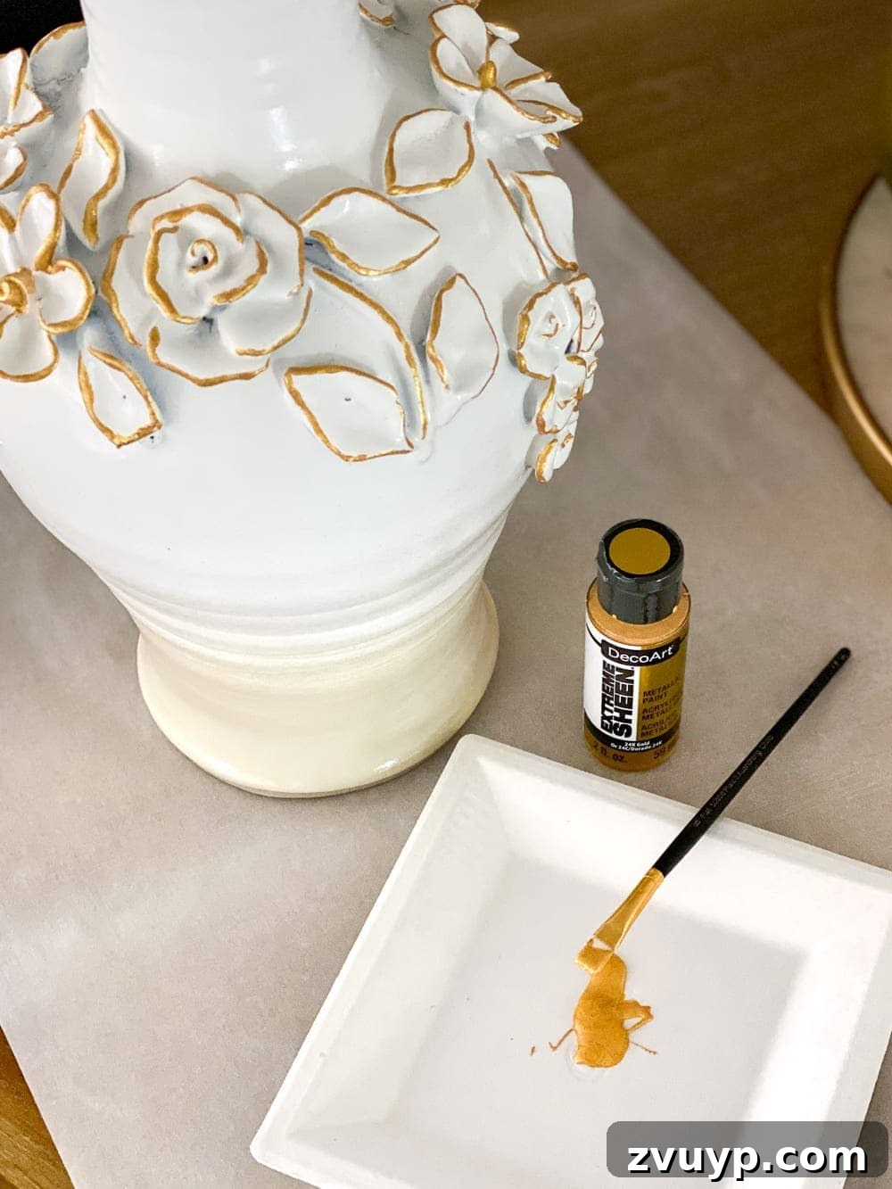 From Knock-Off to Showpiece: Ceramic Bloom Vase Transformation 5 Delicate gold accents applied to the ceramic flowers, adding a touch of elegance to the vase.