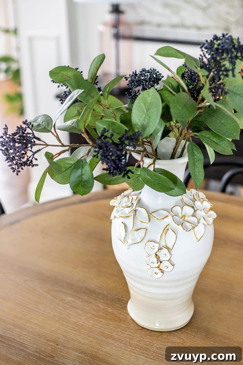 From Knock-Off to Showpiece: Ceramic Bloom Vase Transformation 6 Finished Anthropologie-inspired ceramic vase with ombre spray paint, showcasing a chic, modern makeover.