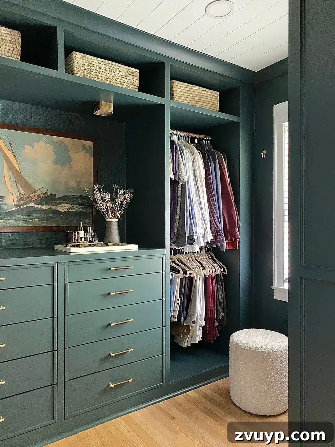 Smart DIY Upgrades for Your IKEA Pax Wardrobe 31 Built-in drawers in a closet, painted green and adorned with unique hardware, demonstrating a personalized touch.