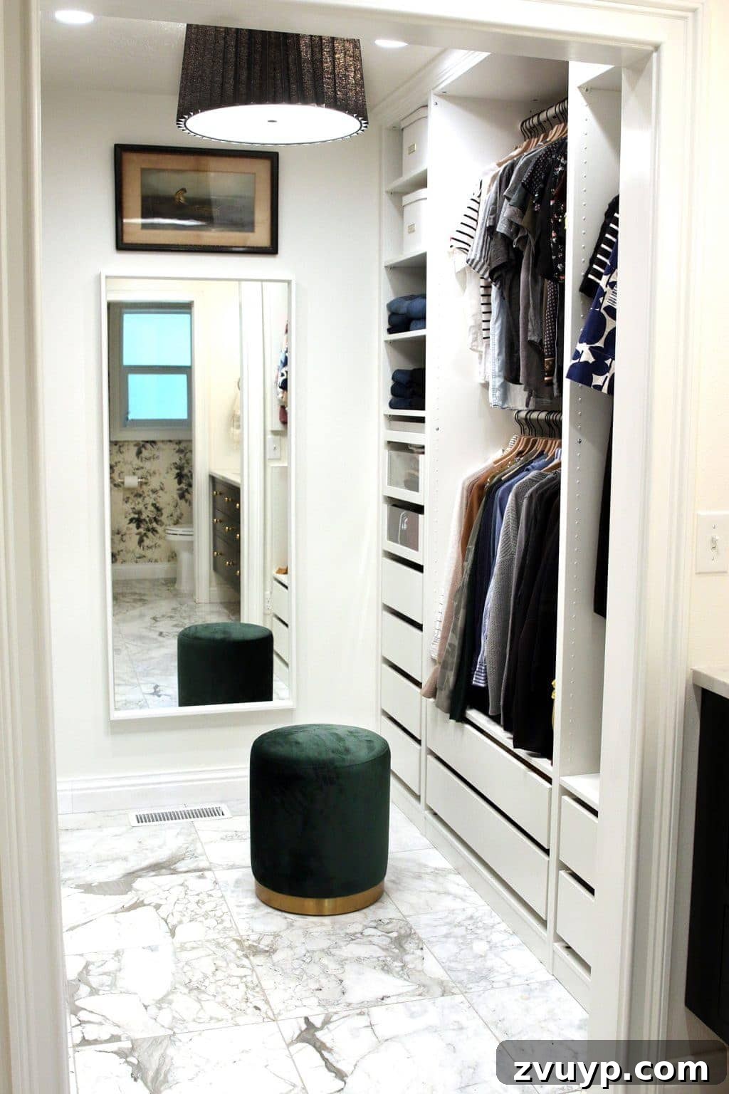 Smart DIY Upgrades for Your IKEA Pax Wardrobe 5 An IKEA PAX closet featuring a full-length mirror, a comfortable dressing stool, and tasteful wall decor, transforming it into a chic dressing room.