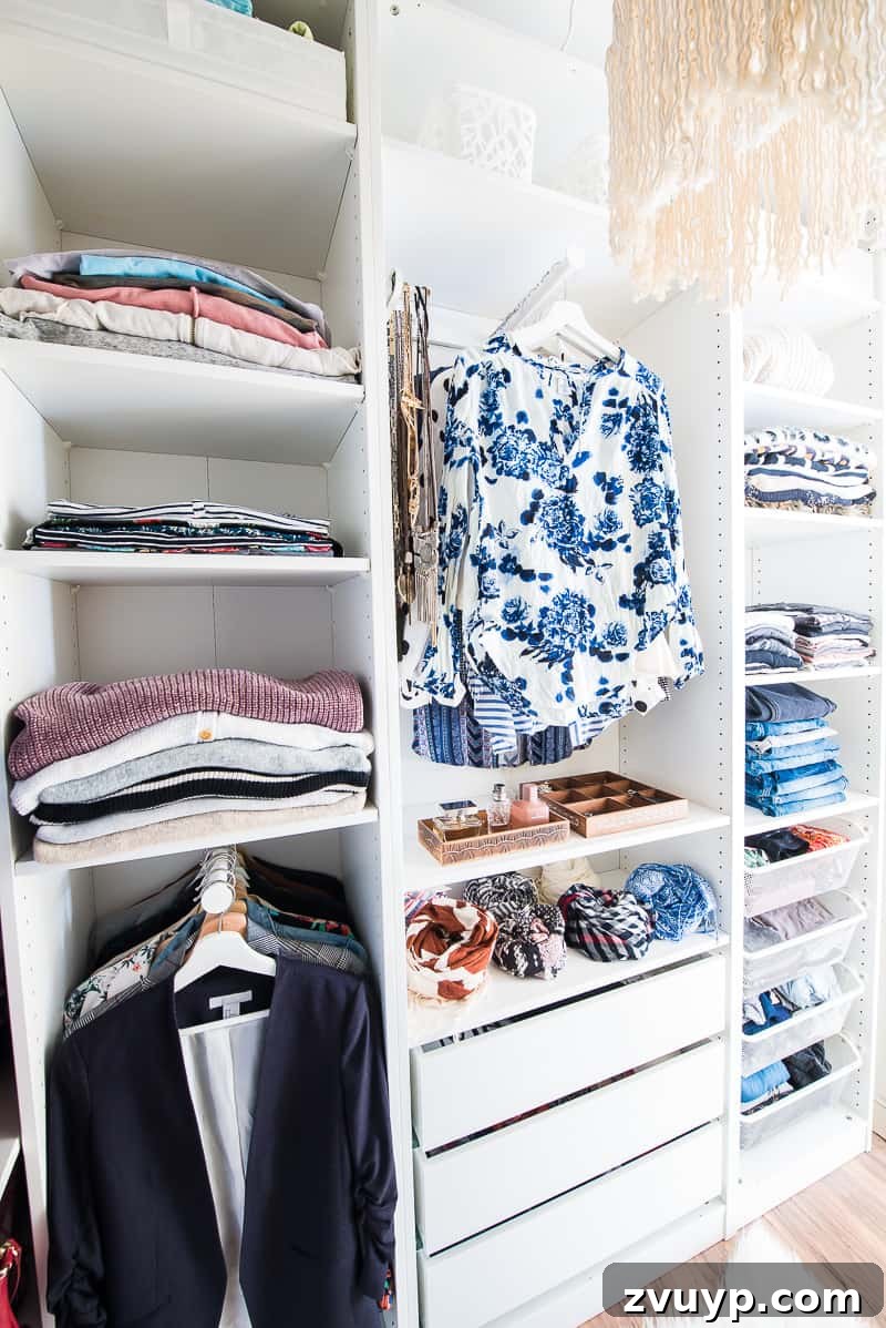Smart DIY Upgrades for Your IKEA Pax Wardrobe 6 An IKEA closet design showcasing efficient use of hanging bars, utilizing the back wall for clothing storage instead of traditional rods between shelves.