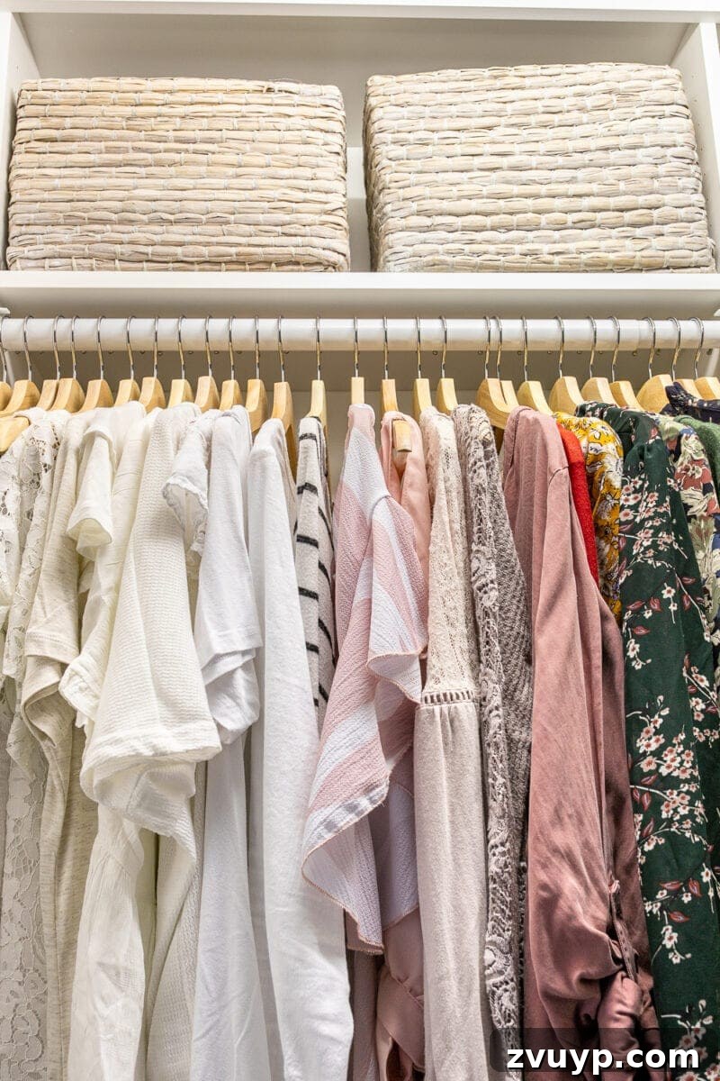 Small Master, Smart Storage: Our IKEA Closet Reveal 12 A close-up of Lauren's organized closet baskets, storing accessories like scarves and hats.