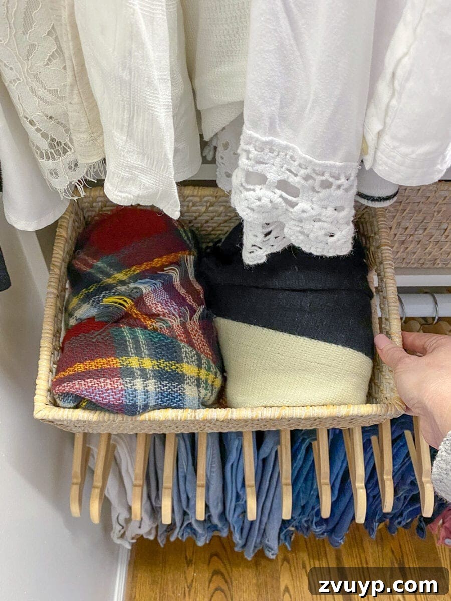 Small Master, Smart Storage: Our IKEA Closet Reveal 13 Another angle of Lauren's organized closet, emphasizing the efficient use of space with hanging clothes and baskets.