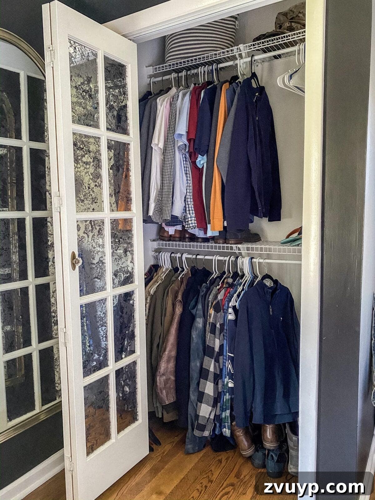 Small Master, Smart Storage: Our IKEA Closet Reveal 5 The messy 'before' shot of Robert's small master bedroom closet, highlighting the need for organization.