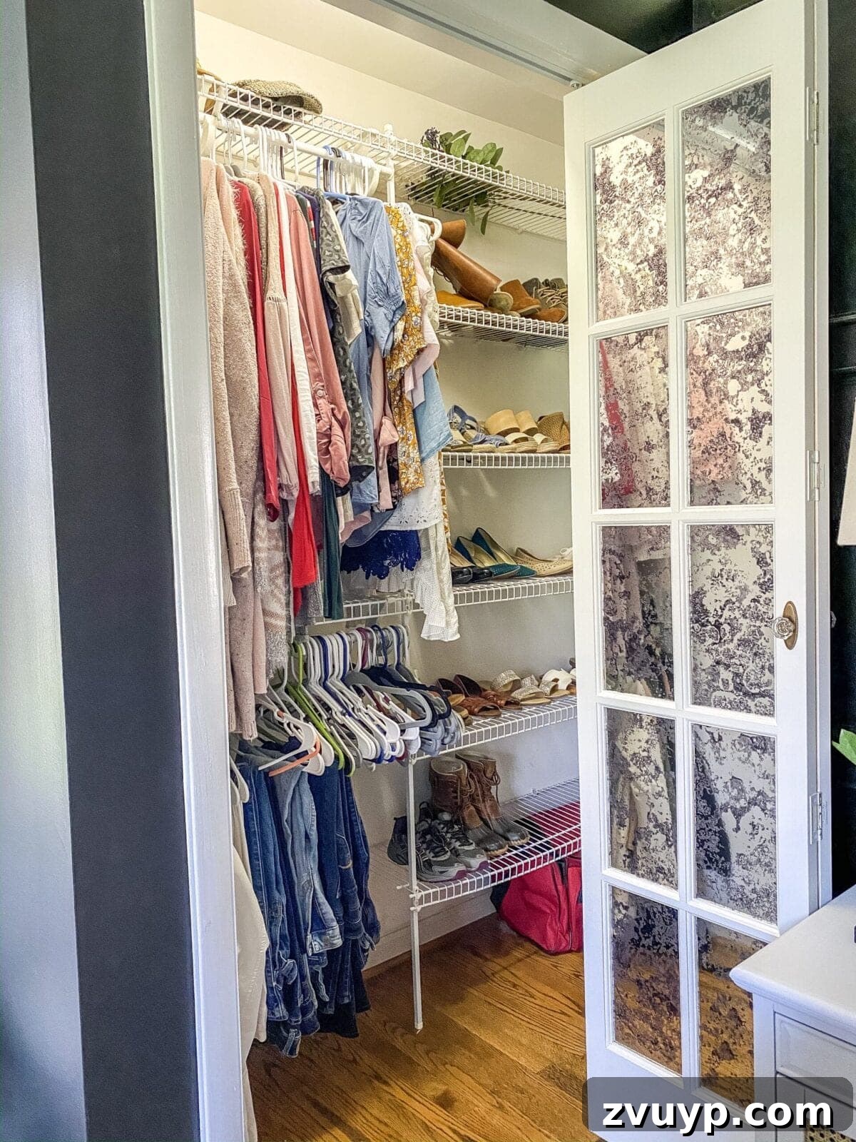 Small Master, Smart Storage: Our IKEA Closet Reveal 10 The cluttered 'before' state of Lauren's small master bedroom closet, highlighting the challenge.