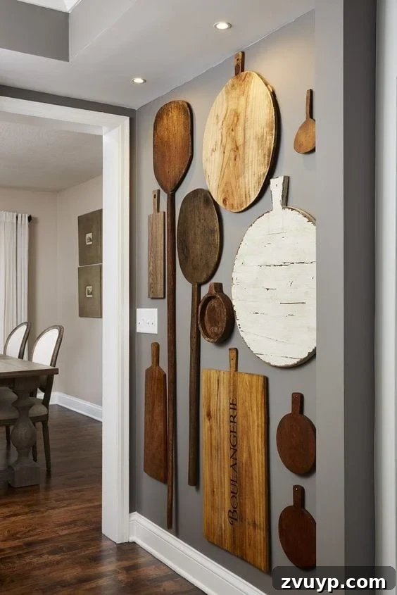 Curate Your Canvas Imaginative DIY Wall Decor 19 cutting boards hung as a kitchen gallery wall