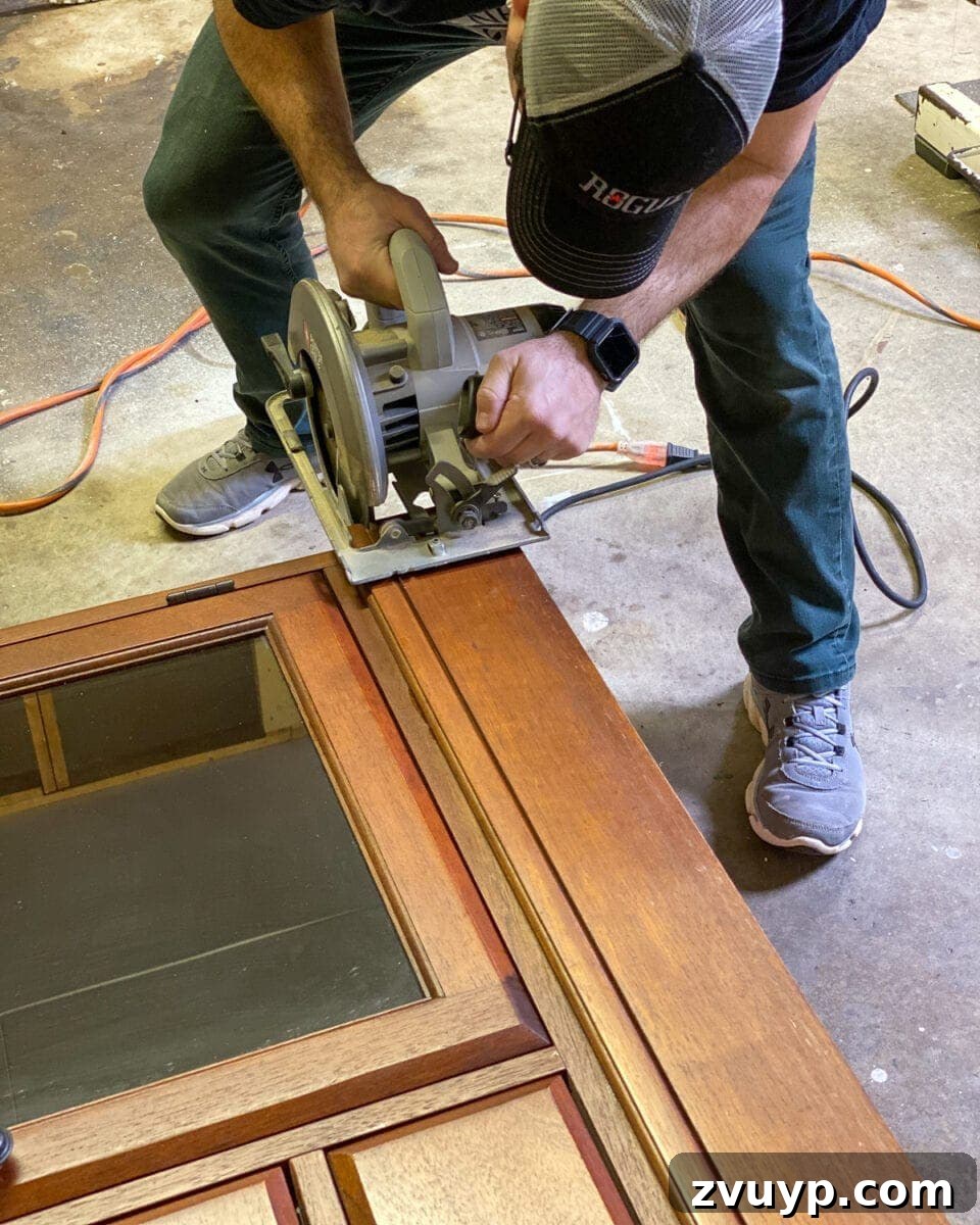 Grasscloth Buffet's Elegant Metamorphosis 4 Footed Grasscloth Buffet Makeover - Cutting off the bulky base with a circular saw