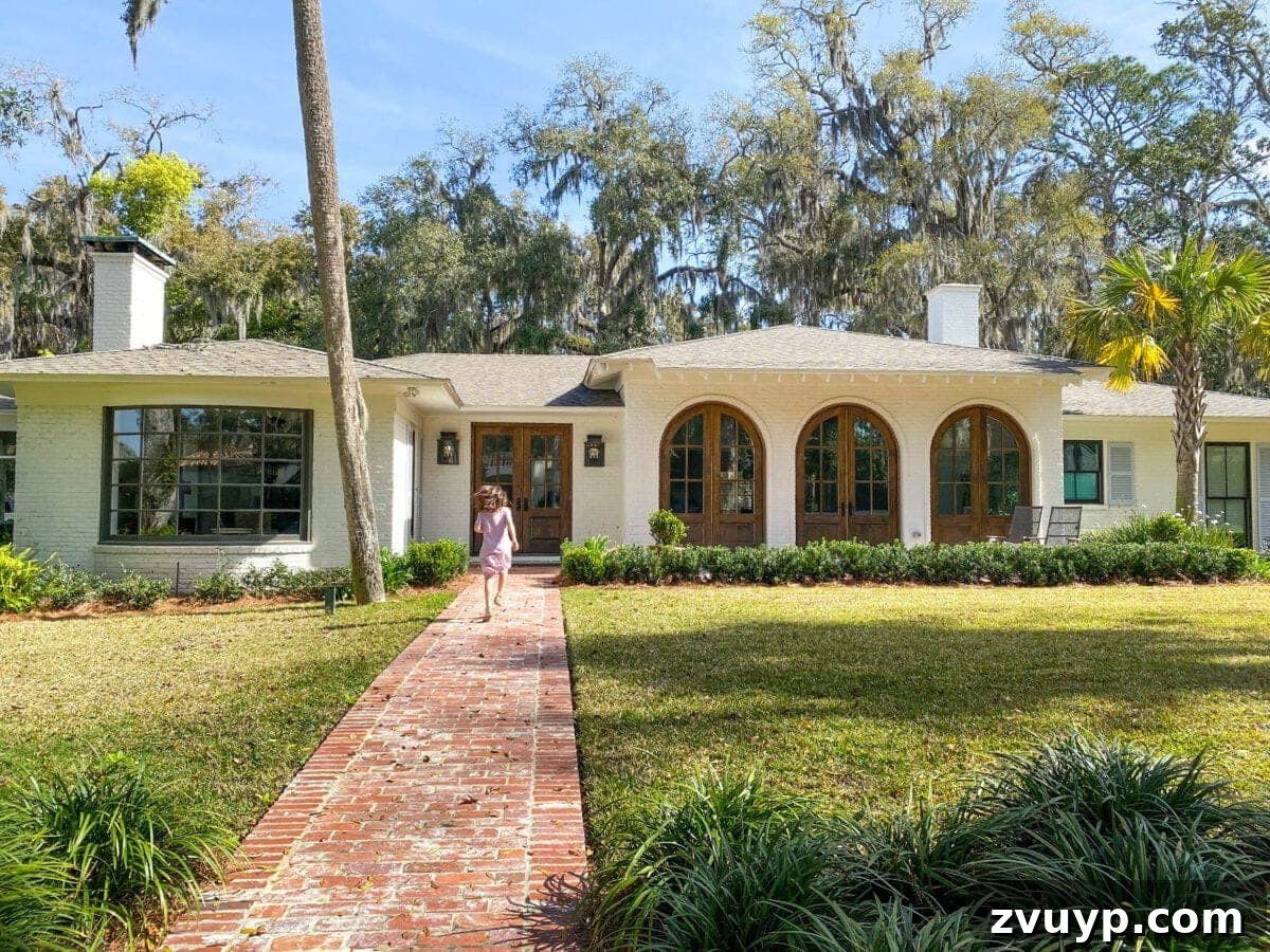 Sea Island Coastal Home Showcase 2 Elegant brick pavers and white brick exterior of a beautifully transformed Sea Island coastal house