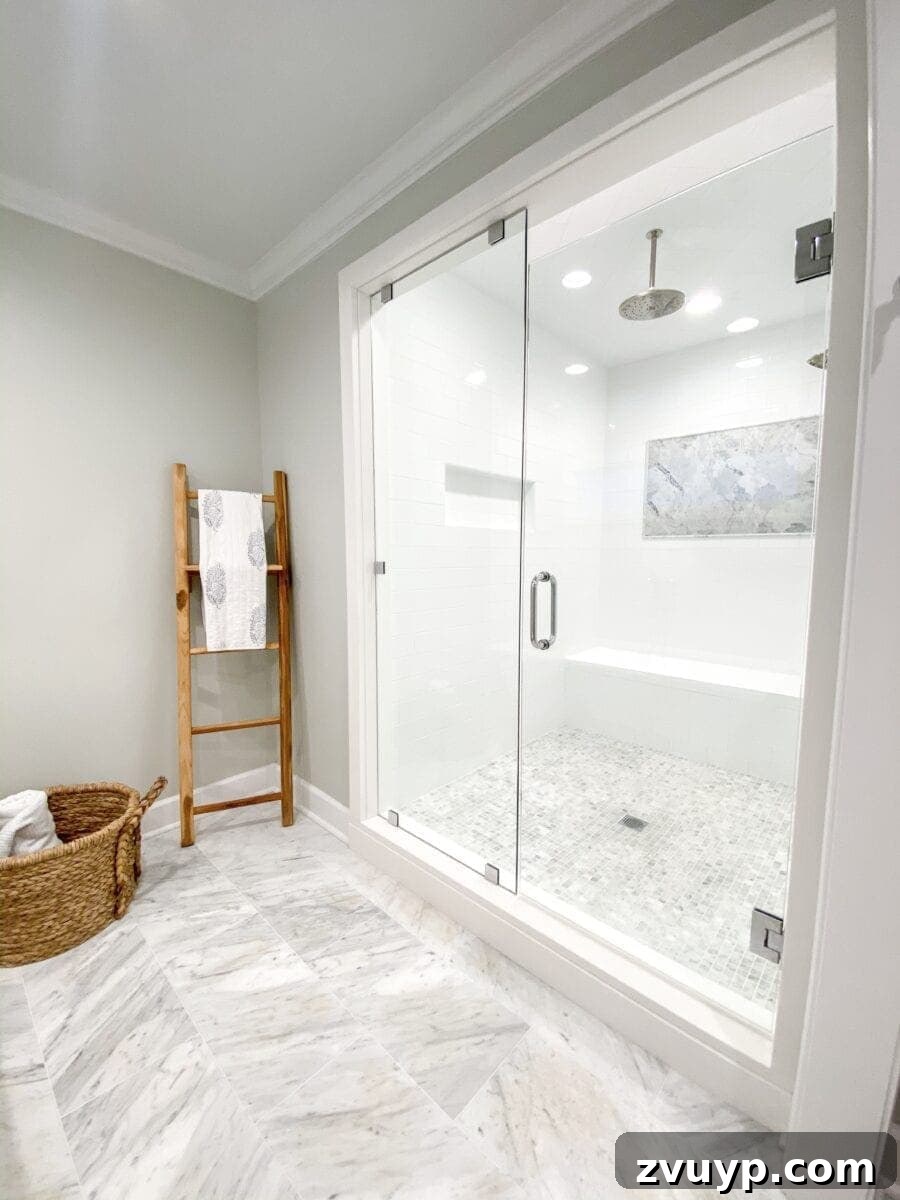 Sea Island Coastal Home Showcase 12 Luxurious and incredibly spacious walk-in shower in a Sea Island coastal house, offering a spa-like experience