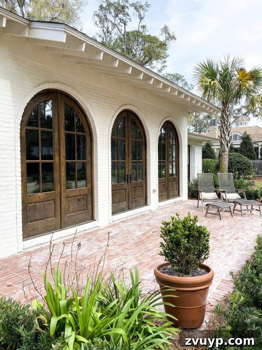 Sea Island Coastal Home Showcase 3 Inviting and serene porch of a Sea Island coastal house, perfect for reading and relaxation