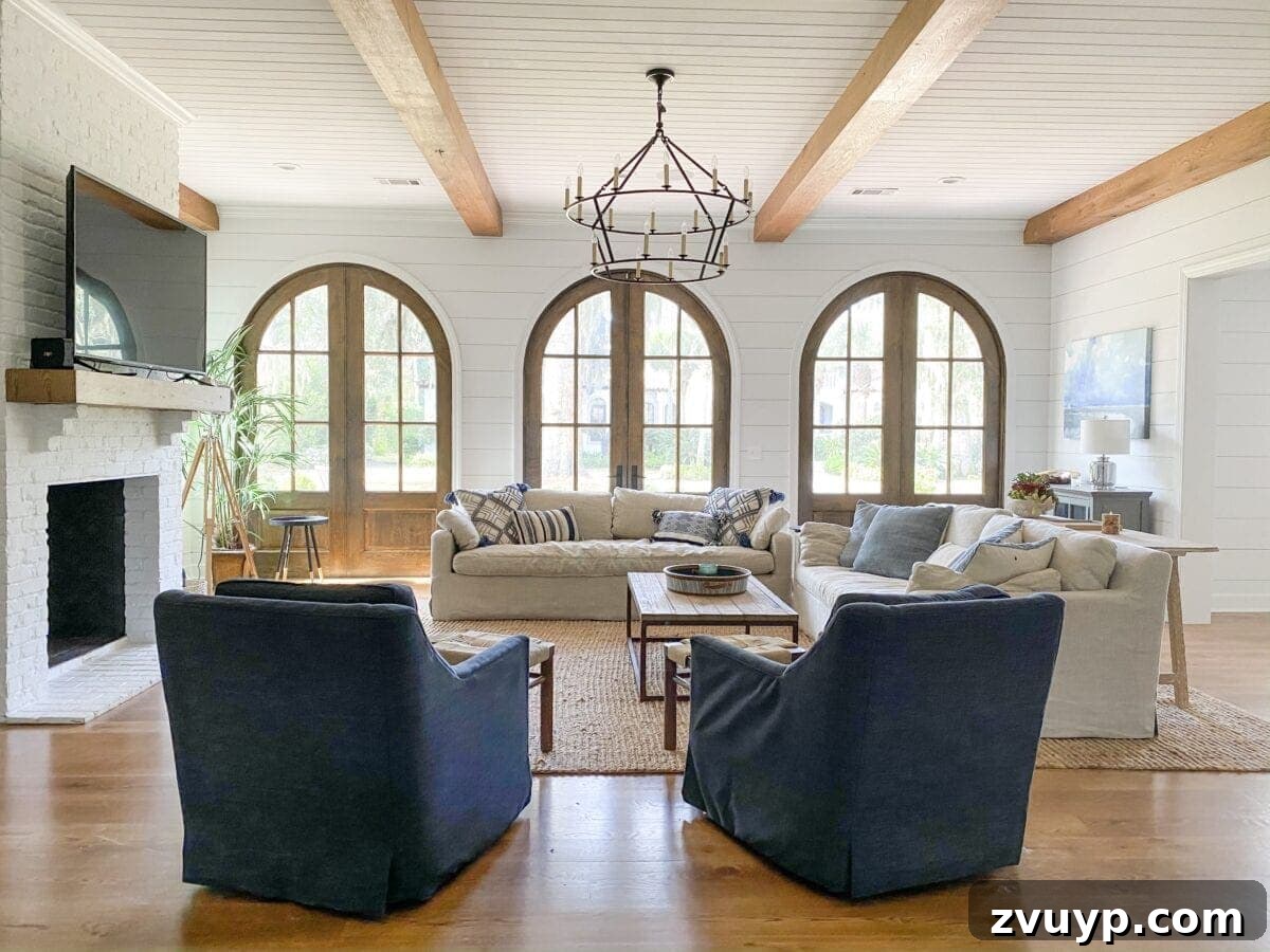Sea Island Coastal Home Showcase 5 Spacious coastal living room on Sea Island, featuring comfortable seating and thoughtfully curated accents