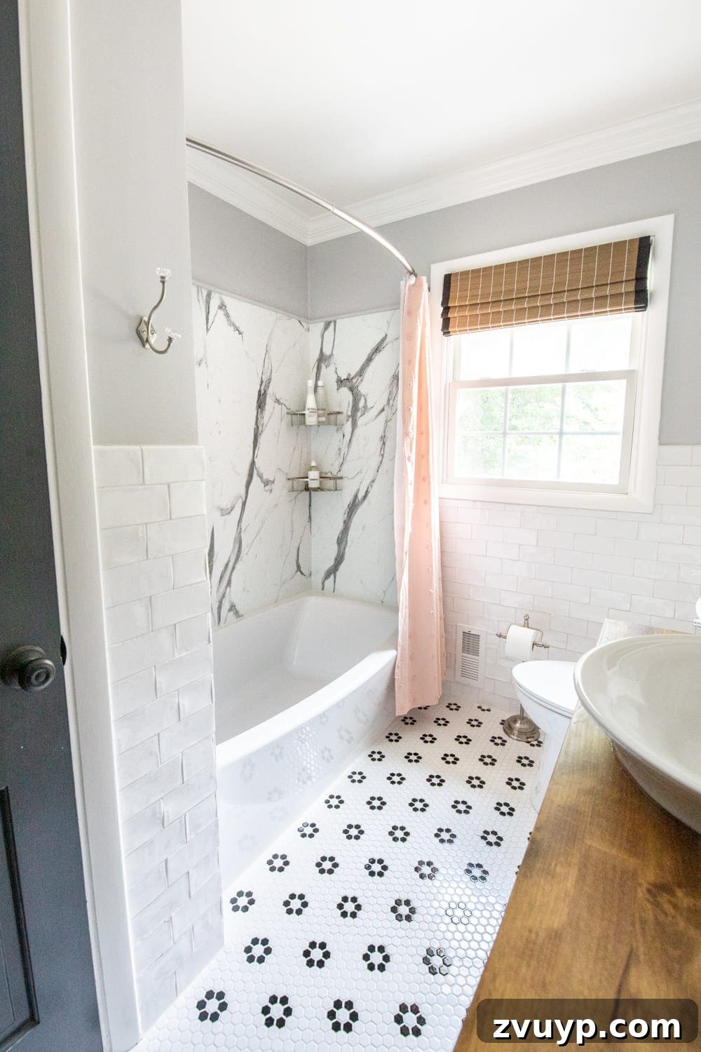 40 Clever Home Decor Upgrades Under $100 9 girls bathroom with pink shower curtain