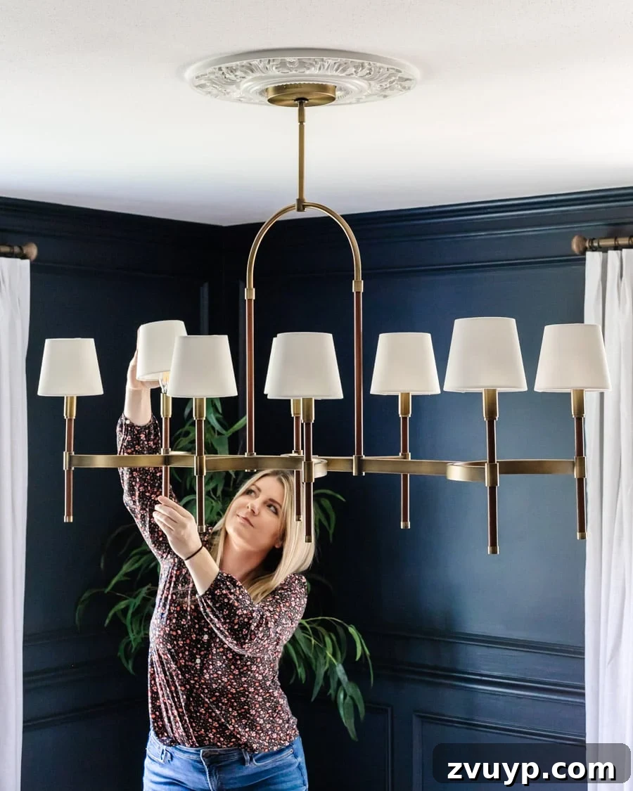 40 Clever Home Decor Upgrades Under $100 10 chandelier installation