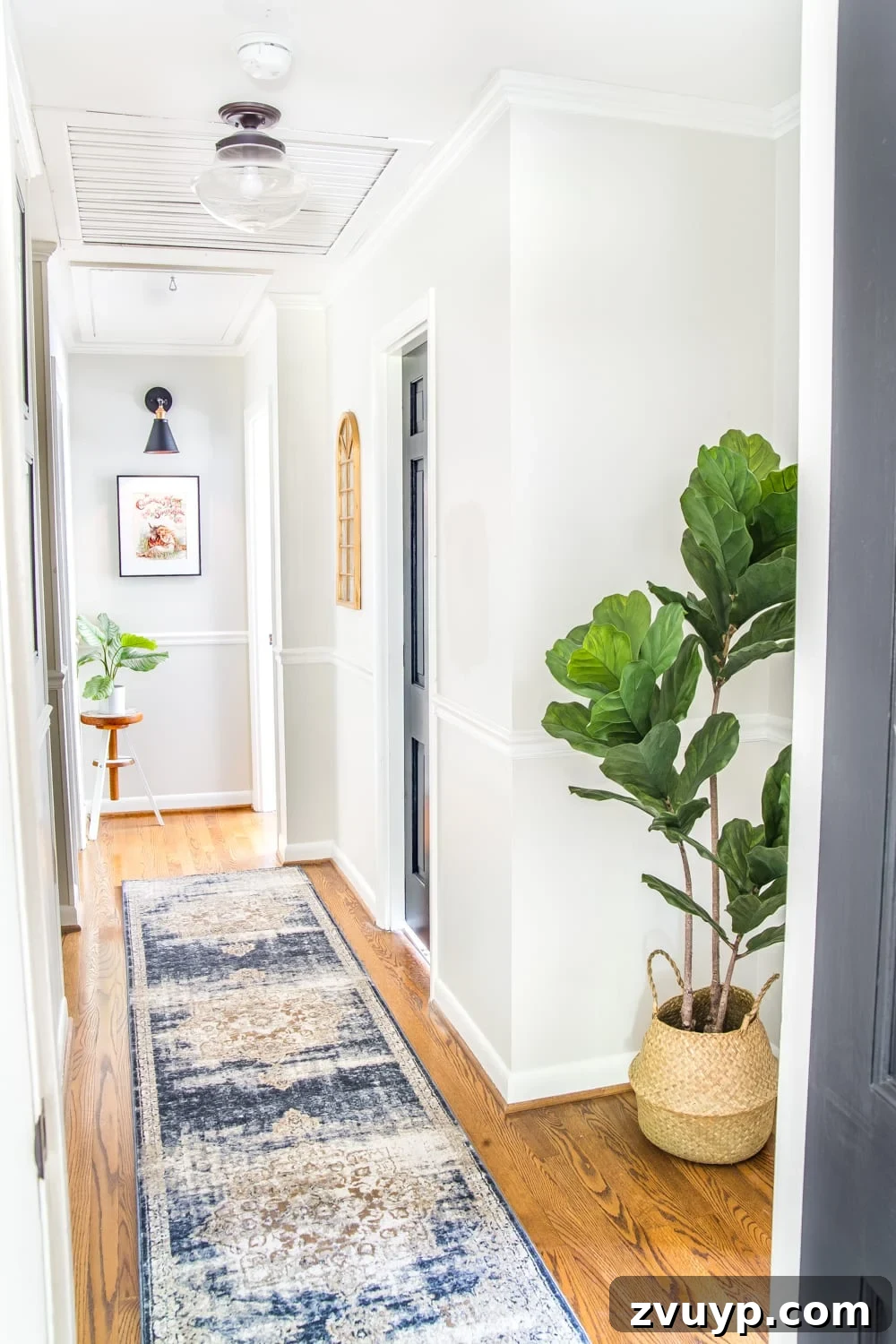 Our Home Sweet Home Three Year Anniversary Tour 19 After photo of the bright and inviting upstairs hallway makeover