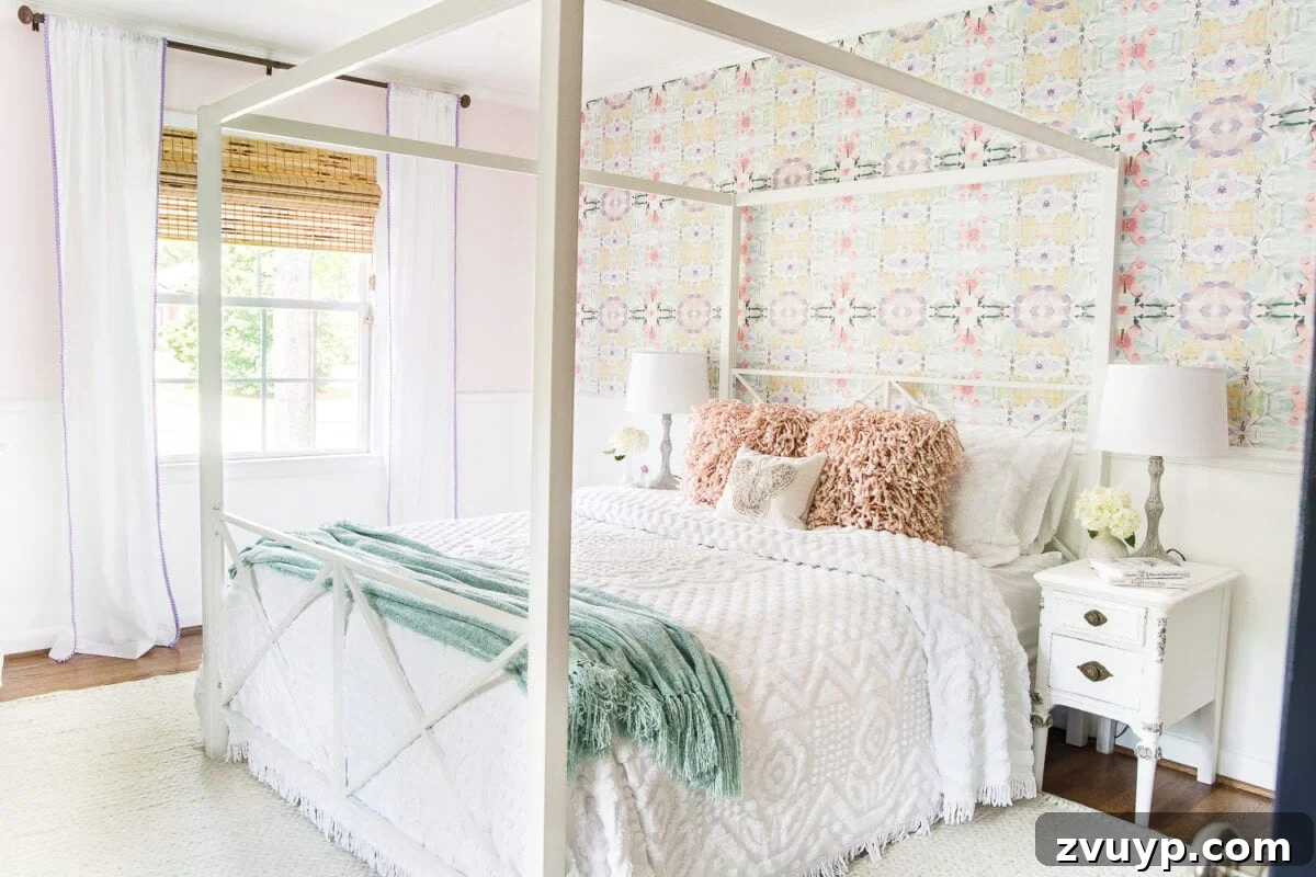 After photo of Olivia's magical bedroom with canopy bed and butterfly wallpaper