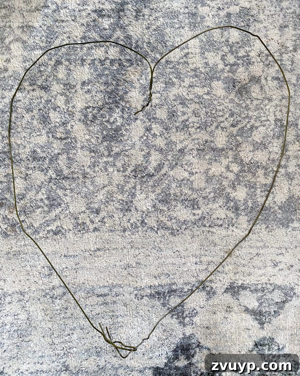 Transforming a Pool Noodle into a Unique Wreath 3 Bending a wire coat hanger into a wreath shape